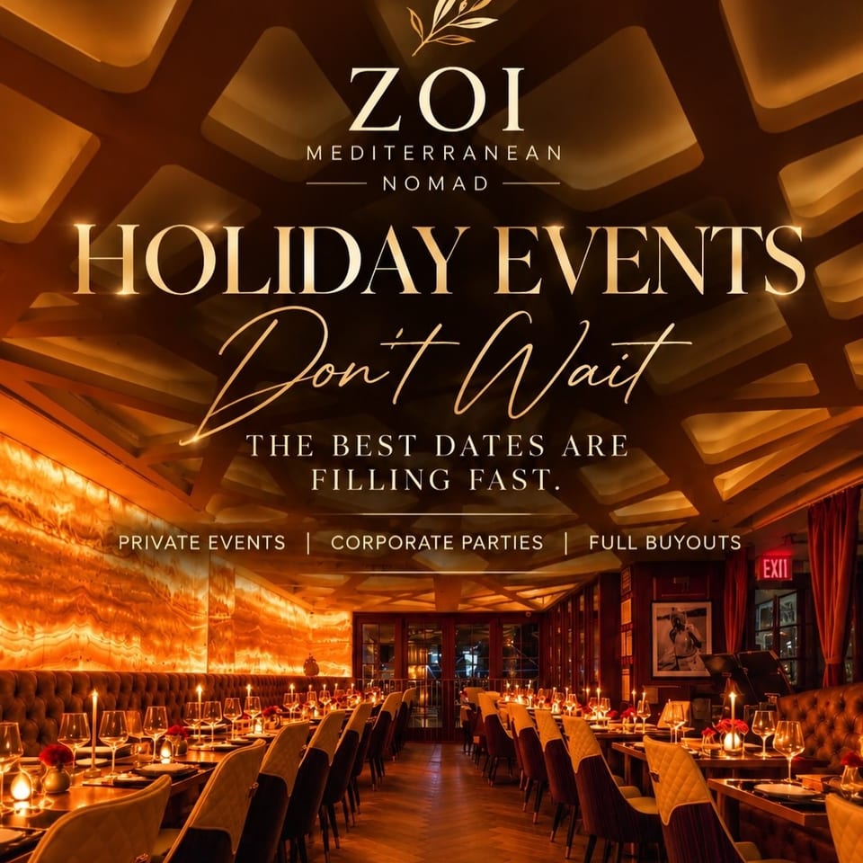 Zoi Mediterranean Nomad holiday events promotion showing an elegant, warmly lit restaurant dining room with set tables and festive candles.